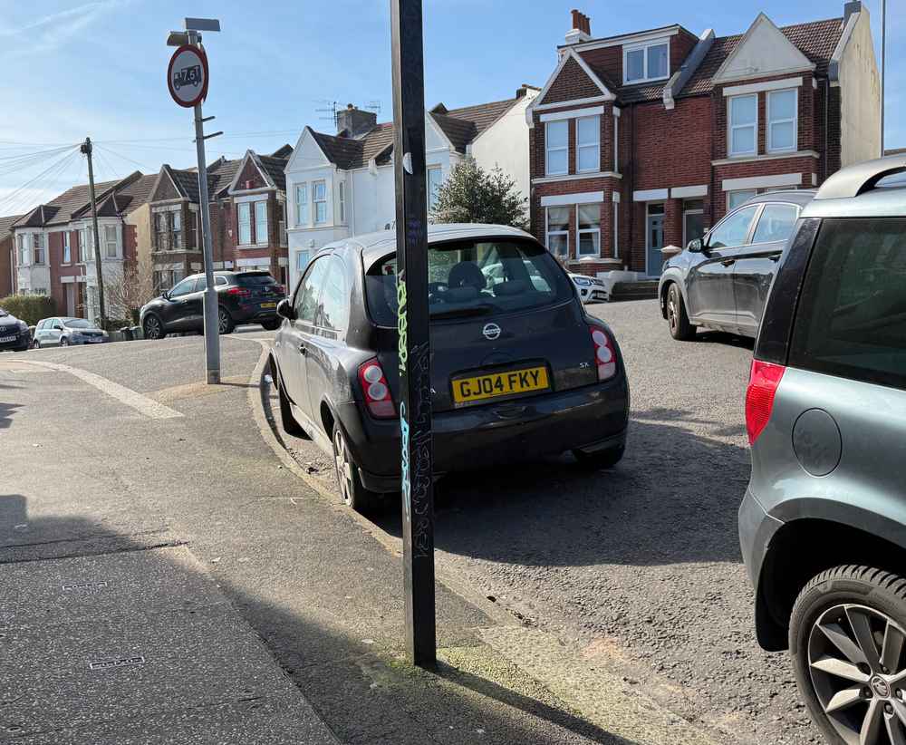 Photograph of GJ04 FKY - a Black Nissan Micra parked in Hollingdean by a non-resident. The sixth of six photographs supplied by the residents of Hollingdean.