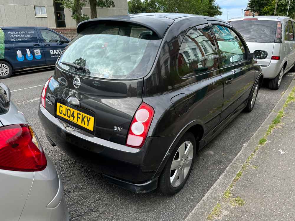 Photograph of GJ04 FKY - a Black Nissan Micra parked in Hollingdean by a non-resident. The third of six photographs supplied by the residents of Hollingdean.