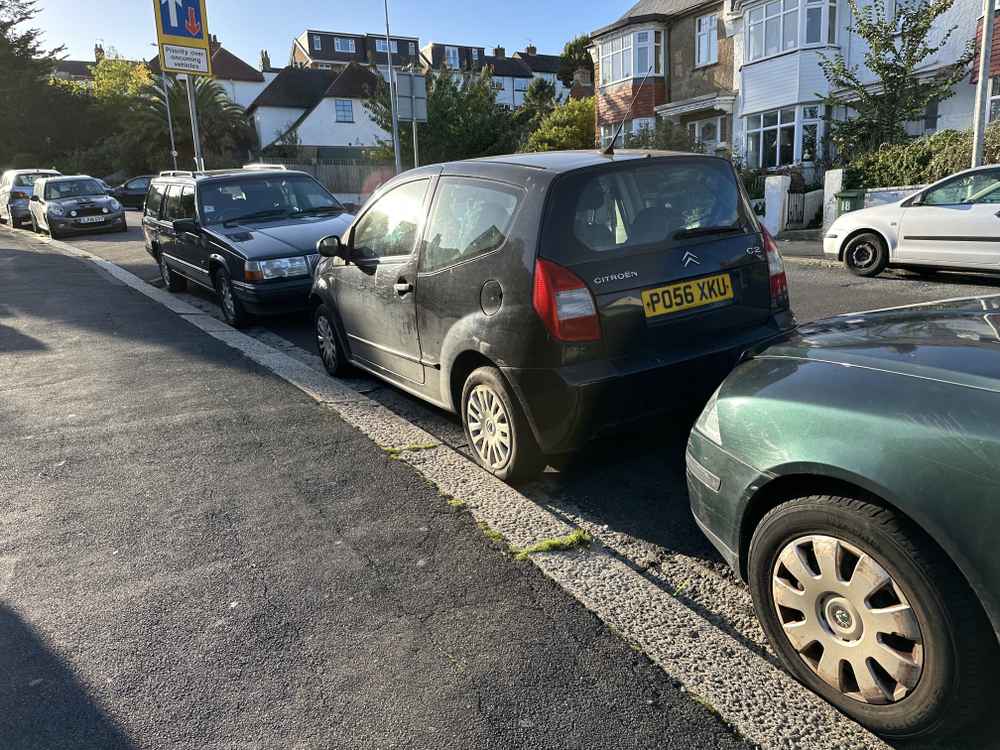 Photograph of PO56 XKU - a Black Citroen C2 parked in Hollingdean by a non-resident. The second of six photographs supplied by the residents of Hollingdean.