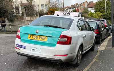 ET66 VHK, a White Skoda Octavia parked in Hollingdean