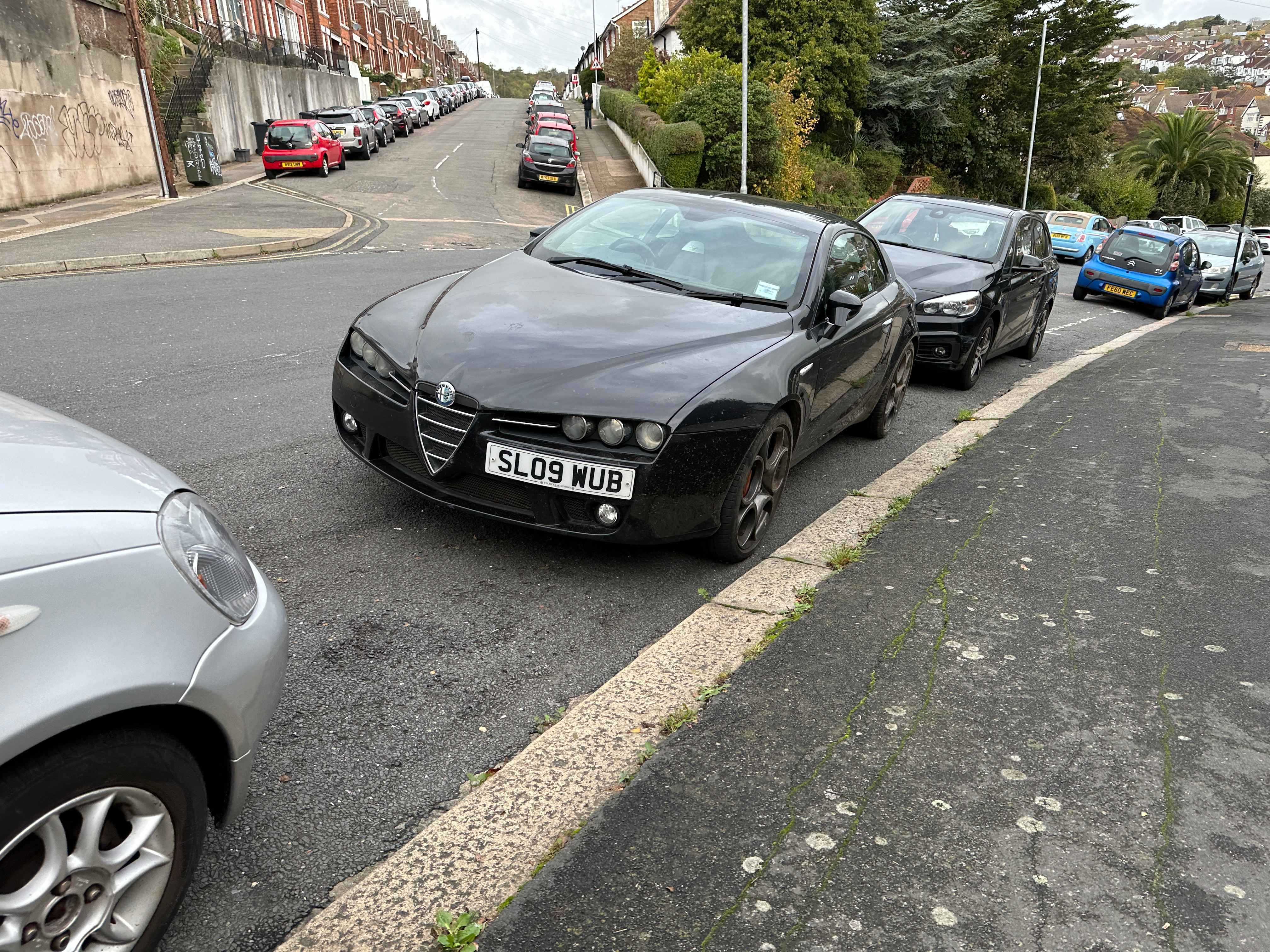 Photograph of SL09 WUB - a Black Alfa Romeo Brera parked in Hollingdean by a non-resident. The ninth of twenty photographs supplied by the residents of Hollingdean.