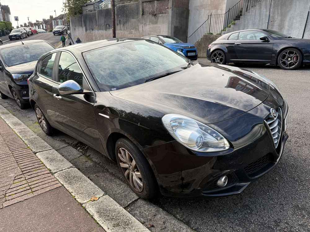 Photograph of VU15 KNV - a Black Alfa Romeo Giulietta parked in Hollingdean by a non-resident. The thirty-first of thirty-four photographs supplied by the residents of Hollingdean.