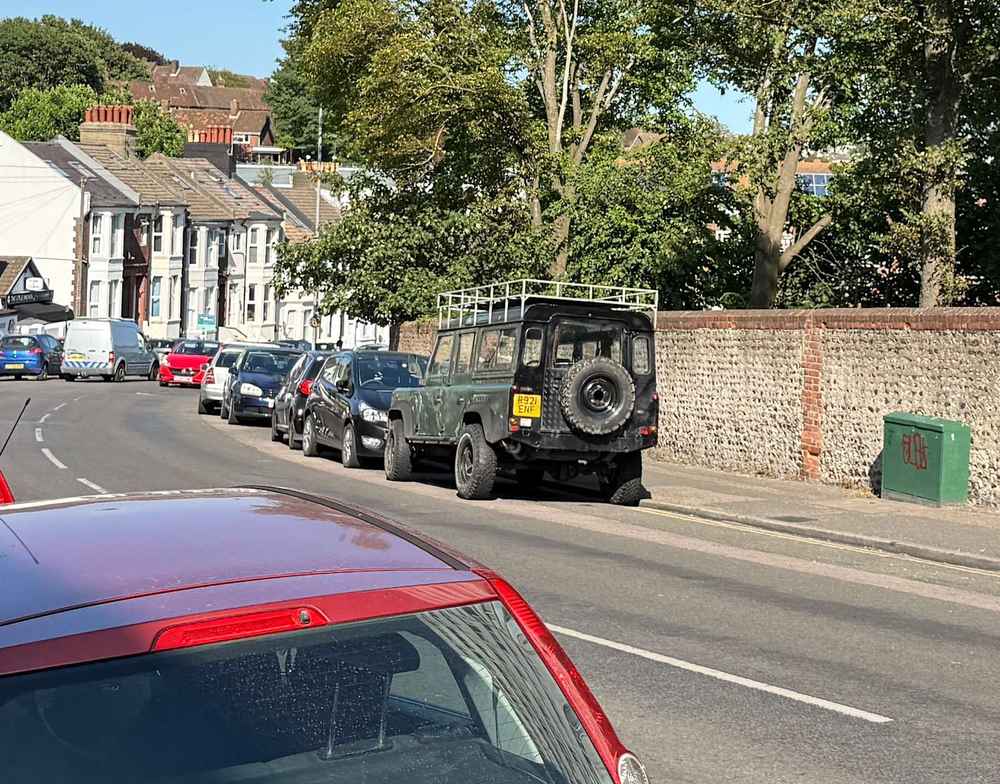 Photograph of R921 ENF - a Green Land Rover Defender parked in Hollingdean by a non-resident. The eighth of twelve photographs supplied by the residents of Hollingdean.
