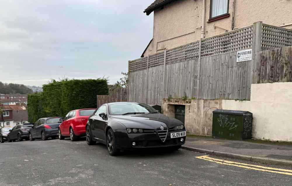 Photograph of SL09 WUB - a Black Alfa Romeo Brera parked in Hollingdean by a non-resident. The twenty-fifth of twenty-nine photographs supplied by the residents of Hollingdean.