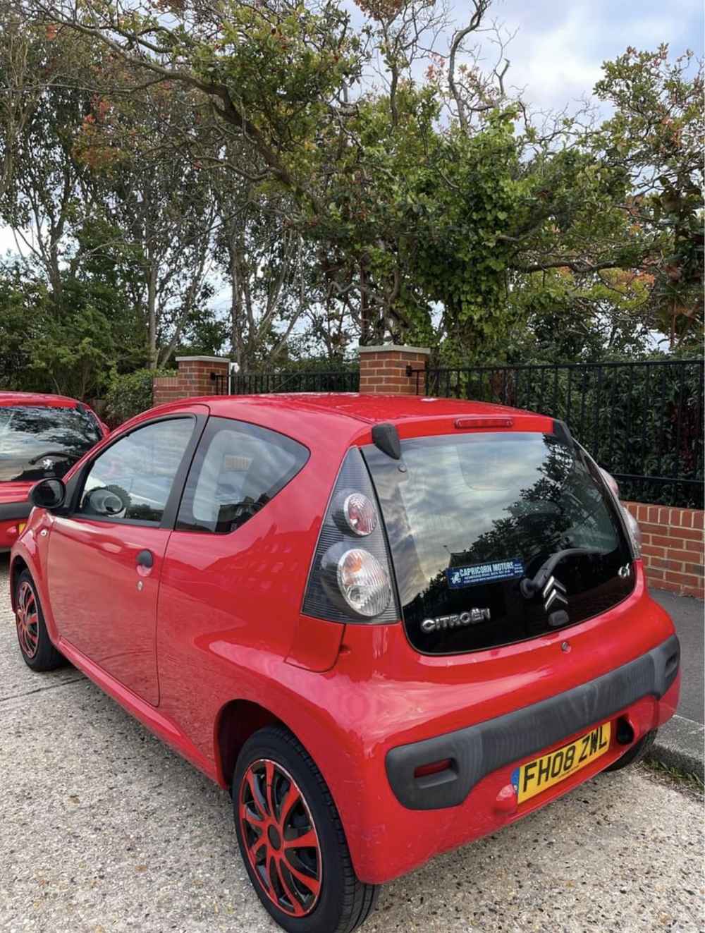 Photograph of FH08 ZWL - a Red Citroen C1 parked in Hollingdean by a non-resident and stored here whilst a dodgy car dealer attempts to sell it. The third of five photographs supplied by the residents of Hollingdean.