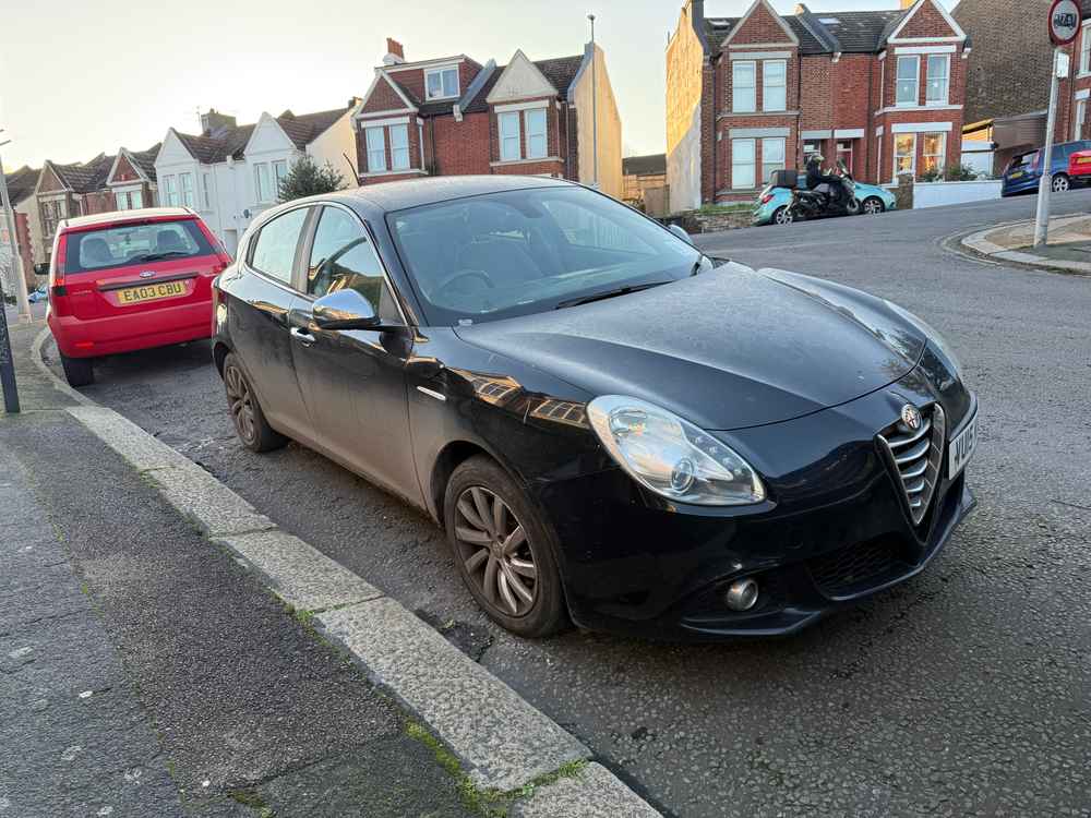 Photograph of VU15 KNV - a Black Alfa Romeo Giulietta parked in Hollingdean by a non-resident. The twenty-second of twenty-two photographs supplied by the residents of Hollingdean.