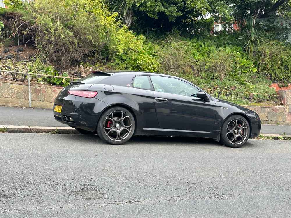 Photograph of SL09 WUB - a Black Alfa Romeo Brera parked in Hollingdean by a non-resident. The twenty-fourth of twenty-nine photographs supplied by the residents of Hollingdean.