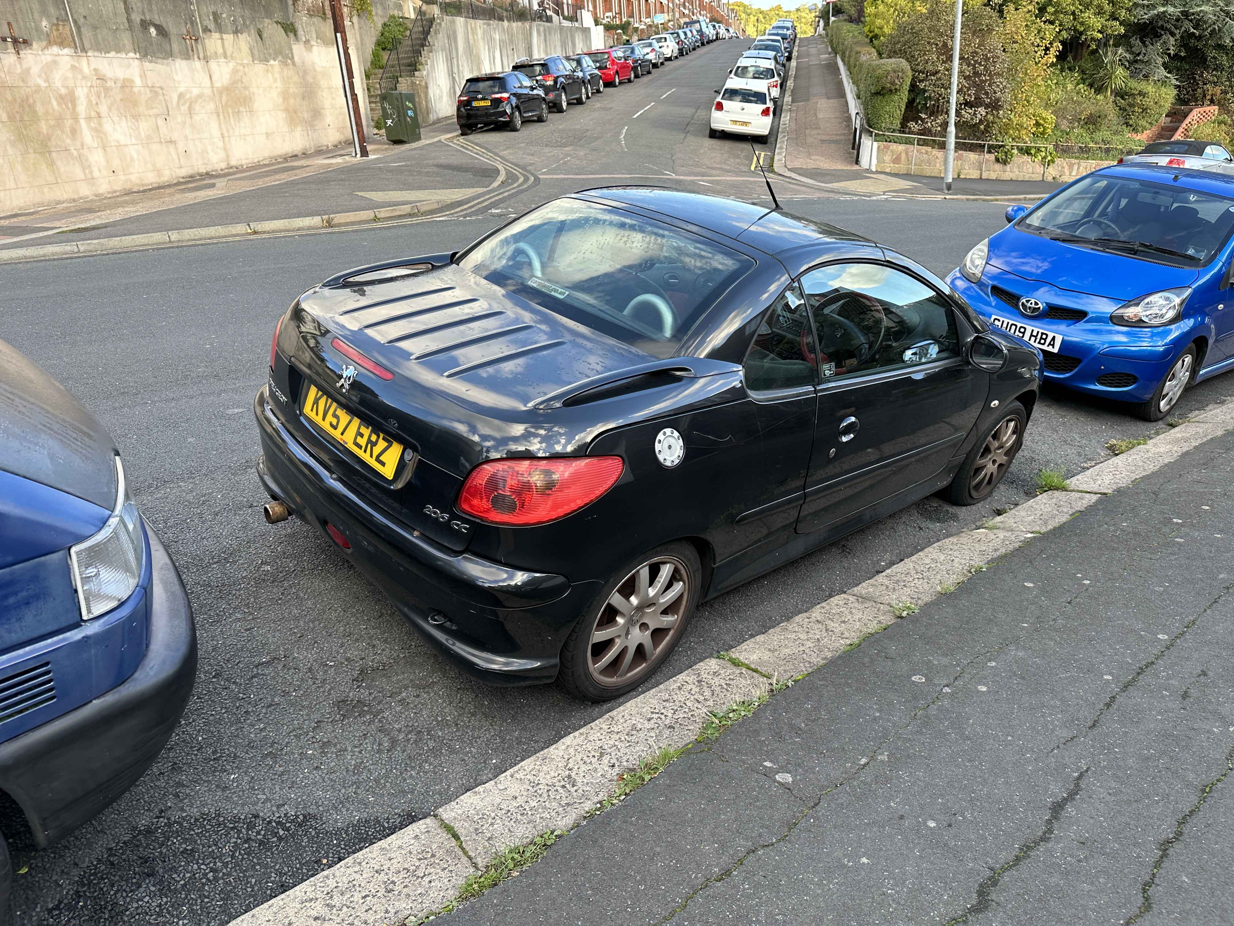 Photograph of KV57 ERZ - a Black Peugeot 206 parked in Hollingdean by a non-resident. The seventh of eight photographs supplied by the residents of Hollingdean.