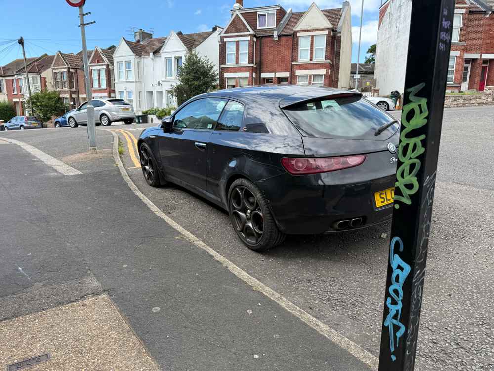Photograph of SL09 WUB - a Black Alfa Romeo Brera parked in Hollingdean by a non-resident. The thirty-fourth of thirty-eight photographs supplied by the residents of Hollingdean.