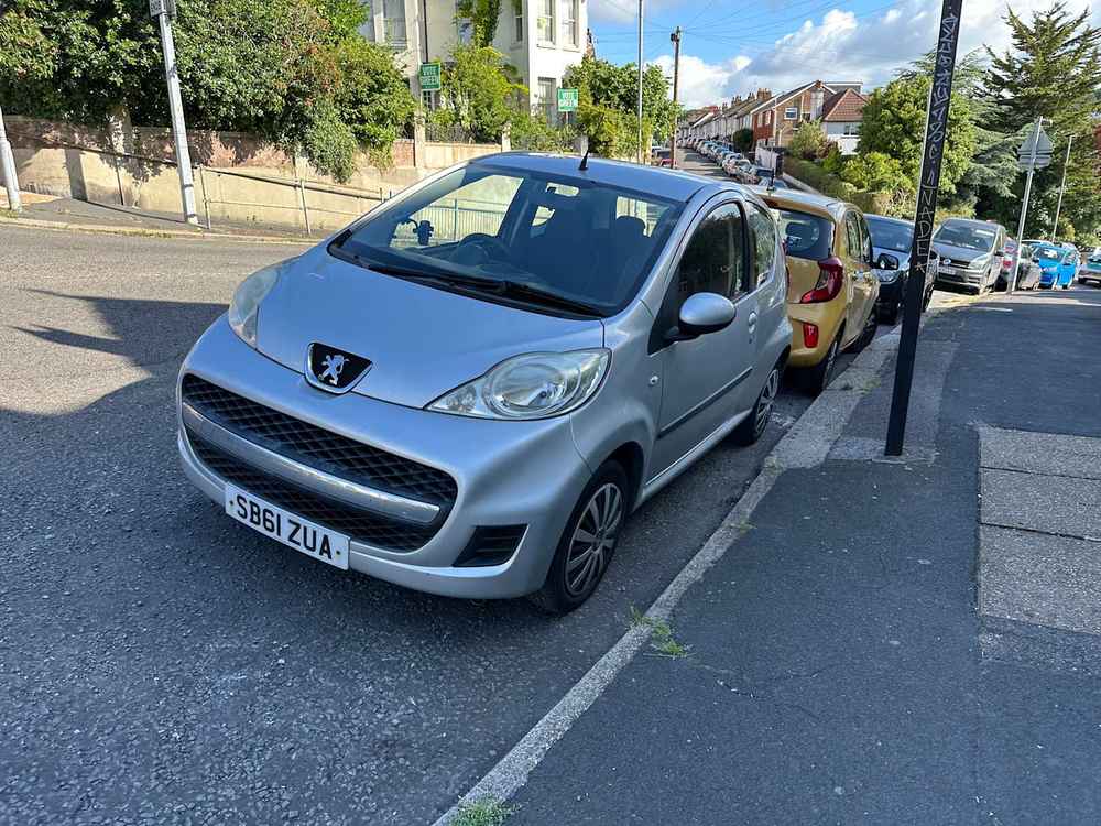 Photograph of SB61 ZUA - a Silver Peugeot 107 parked in Hollingdean by a non-resident. 