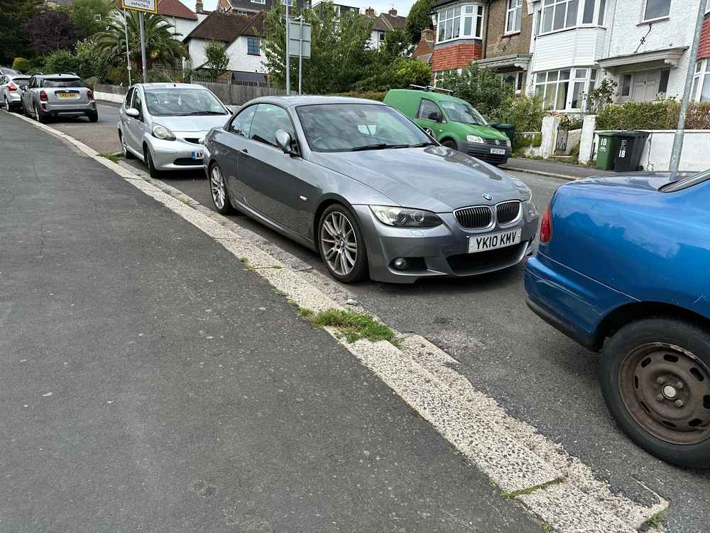 Photograph of YK10 KMV - a Silver BMW 3 Series parked in Hollingdean by a non-resident. The second of thirteen photographs supplied by the residents of Hollingdean.
