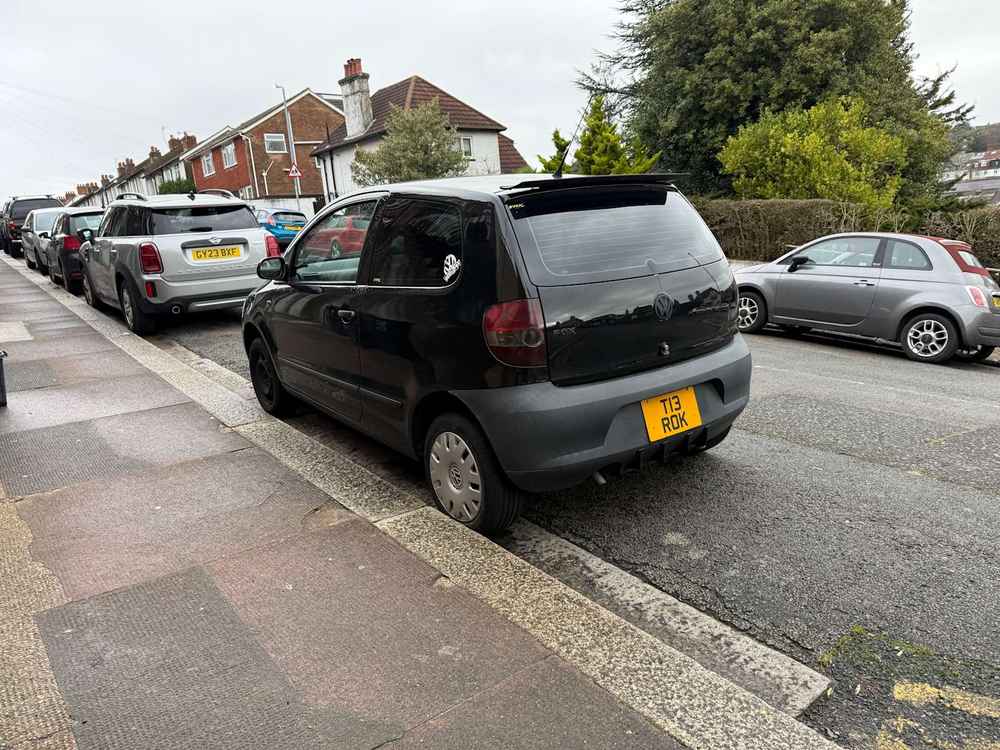 Photograph of T13 ROK - a Black Volkswagen Fox parked in Hollingdean by a non-resident. The third of four photographs supplied by the residents of Hollingdean.