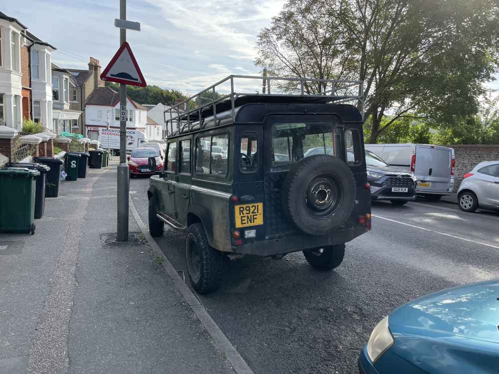 Photograph of R921 ENF - a Green Land Rover Defender parked in Hollingdean by a non-resident. The second of six photographs supplied by the residents of Hollingdean.