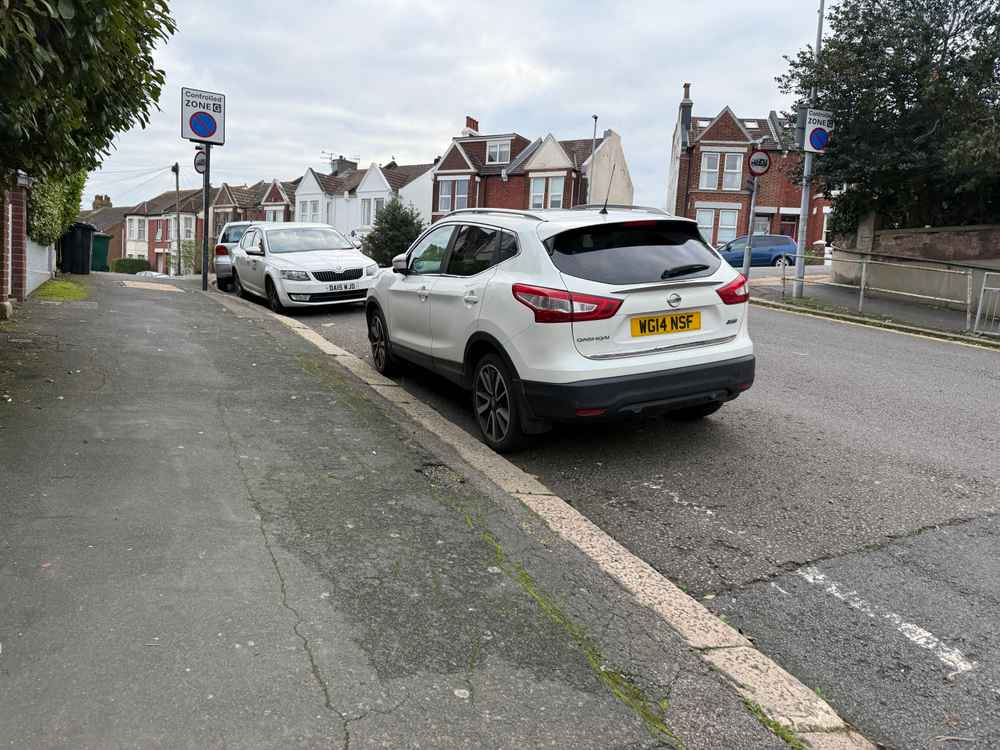 Photograph of WG14 NSF - a White Nissan Qasqai parked in Hollingdean by a non-resident who uses the local area as part of their Brighton commute. The second of five photographs supplied by the residents of Hollingdean.