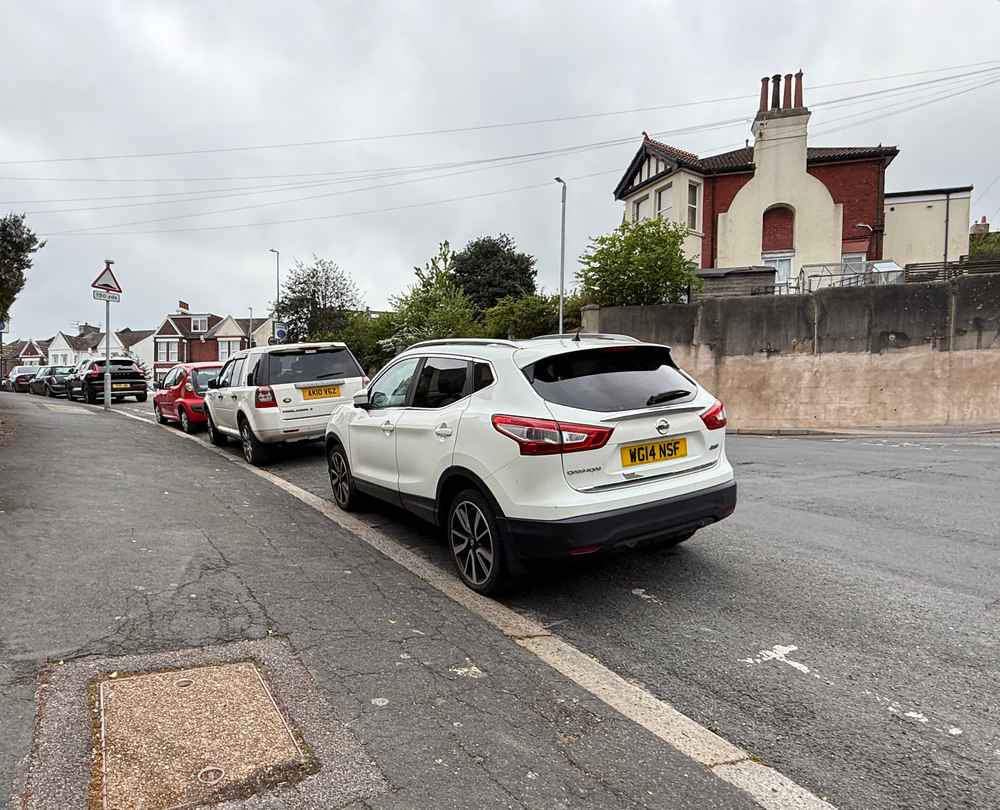 Photograph of WG14 NSF - a White Nissan Qashqai parked in Hollingdean by a non-resident who uses the local area as part of their Brighton commute. The seventh of seven photographs supplied by the residents of Hollingdean.