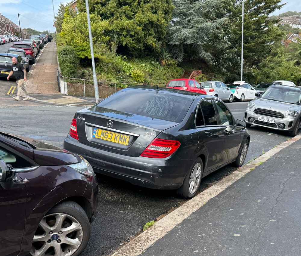 Photograph of LM63 KMK - a Black Mercedes C Class parked in Hollingdean by a non-resident who uses the local area as part of their Brighton commute. The seventh of seven photographs supplied by the residents of Hollingdean.