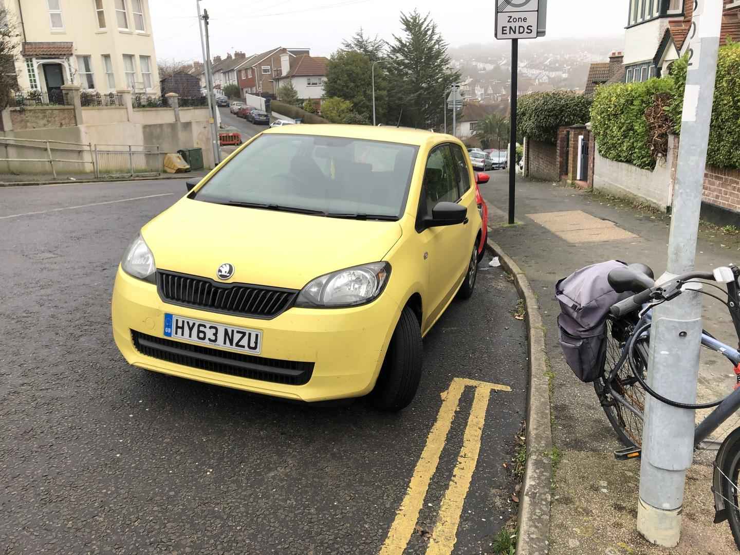 Photograph of HY63 NZU - a Yellow Skoda Citigo parked in Hollingdean by a non-resident. The first of four photographs supplied by the residents of Hollingdean.