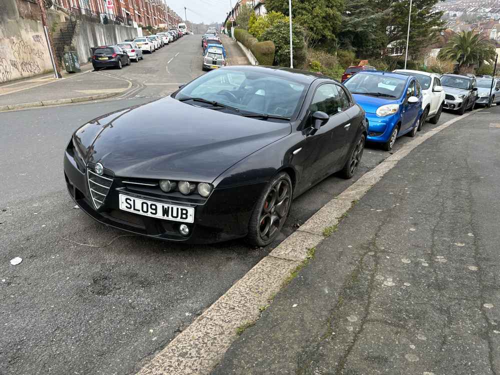 Photograph of SL09 WUB - a Black Alfa Romeo Brera parked in Hollingdean by a non-resident. The seventeenth of twenty-six photographs supplied by the residents of Hollingdean.