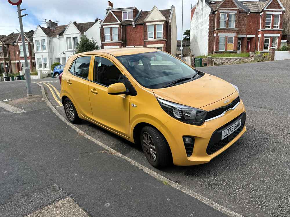 Photograph of LD73 BNU - a Yellow Kia Picanto parked in Hollingdean by a non-resident. The fourth of four photographs supplied by the residents of Hollingdean.