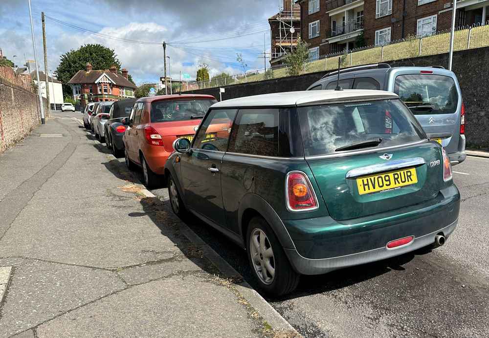 Photograph of HV09 RUR - a Green Mini Cooper parked in Hollingdean by a non-resident. 