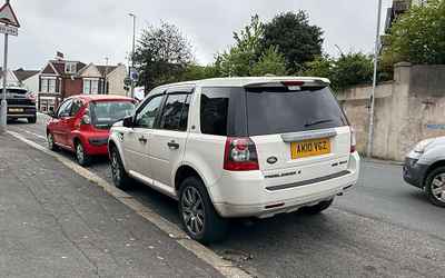 AK10 VGZ, a White Land Rover Freelander parked in Hollingdean
