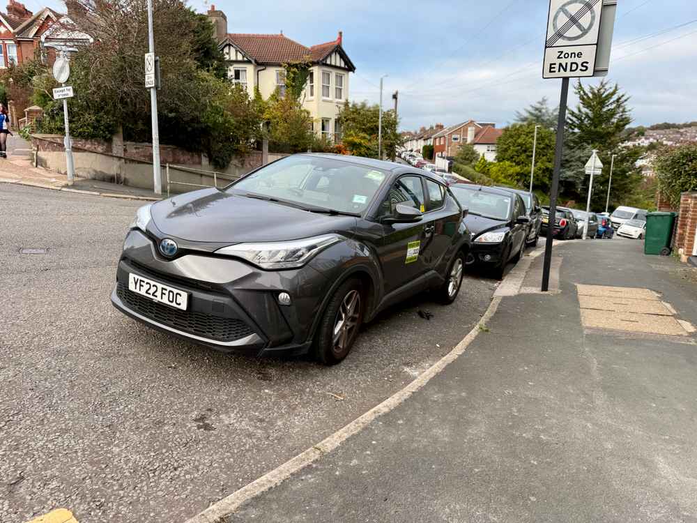 Photograph of YF22 FOC - a Grey Toyota C-HR taxi parked in Hollingdean by a non-resident. The fifth of seven photographs supplied by the residents of Hollingdean.
