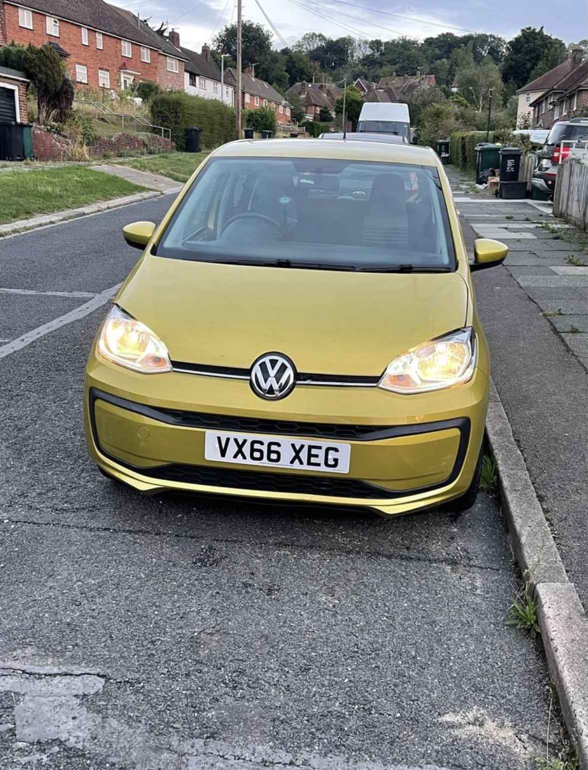 Photograph of VX66 XEG - a Gold Volkswagen Up parked in Hollingdean by a non-resident and stored here whilst a dodgy car dealer attempts to sell it. The second of four photographs supplied by the residents of Hollingdean.