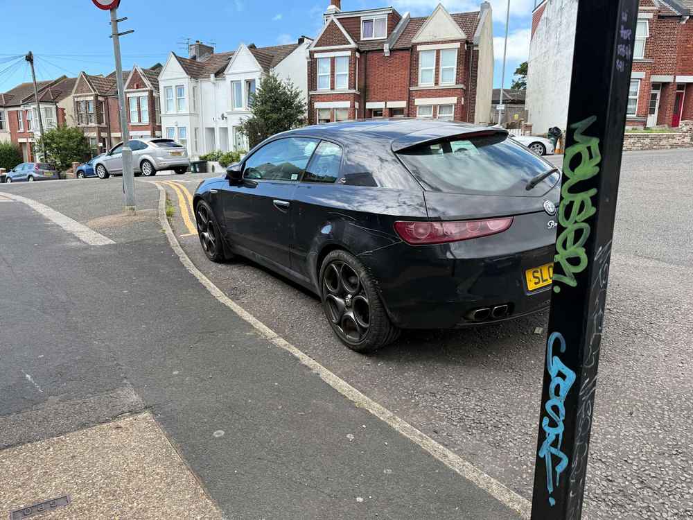 Photograph of SL09 WUB - a Black Alfa Romeo Brera parked in Hollingdean by a non-resident. The thirty-fourth of forty-four photographs supplied by the residents of Hollingdean.