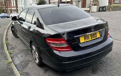 R111 BBD, a Black Mercedes C Class parked in Hollingdean