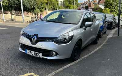 P60 KCS, a Silver Renault Clio parked in Hollingdean