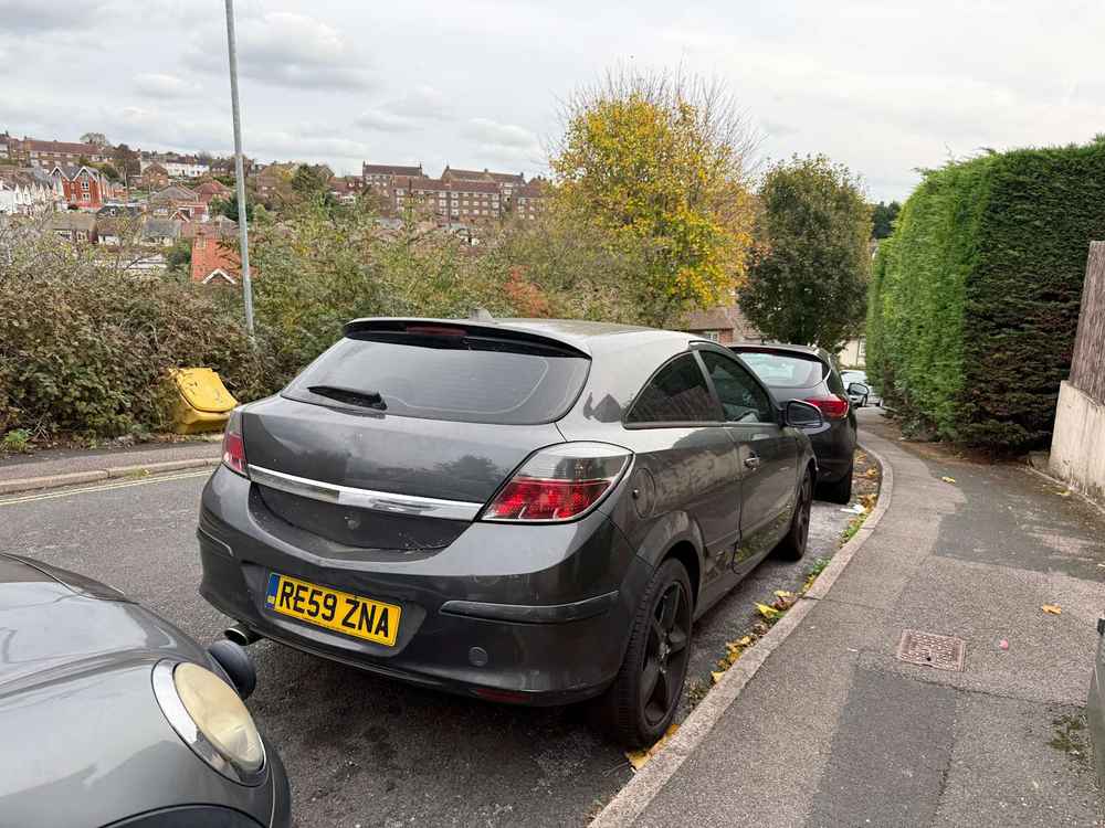 Photograph of RE59 ZNA - a Grey Vauxhall Astra parked in Hollingdean by a non-resident. The twenty-second of twenty-four photographs supplied by the residents of Hollingdean.