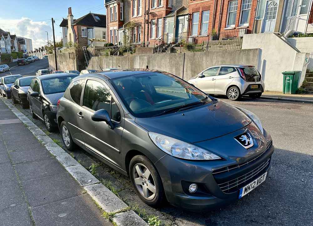 Photograph of MK12 VGT - a Grey Peugeot 207 parked in Hollingdean by a non-resident who uses the local area as part of their Brighton commute. The third of six photographs supplied by the residents of Hollingdean.