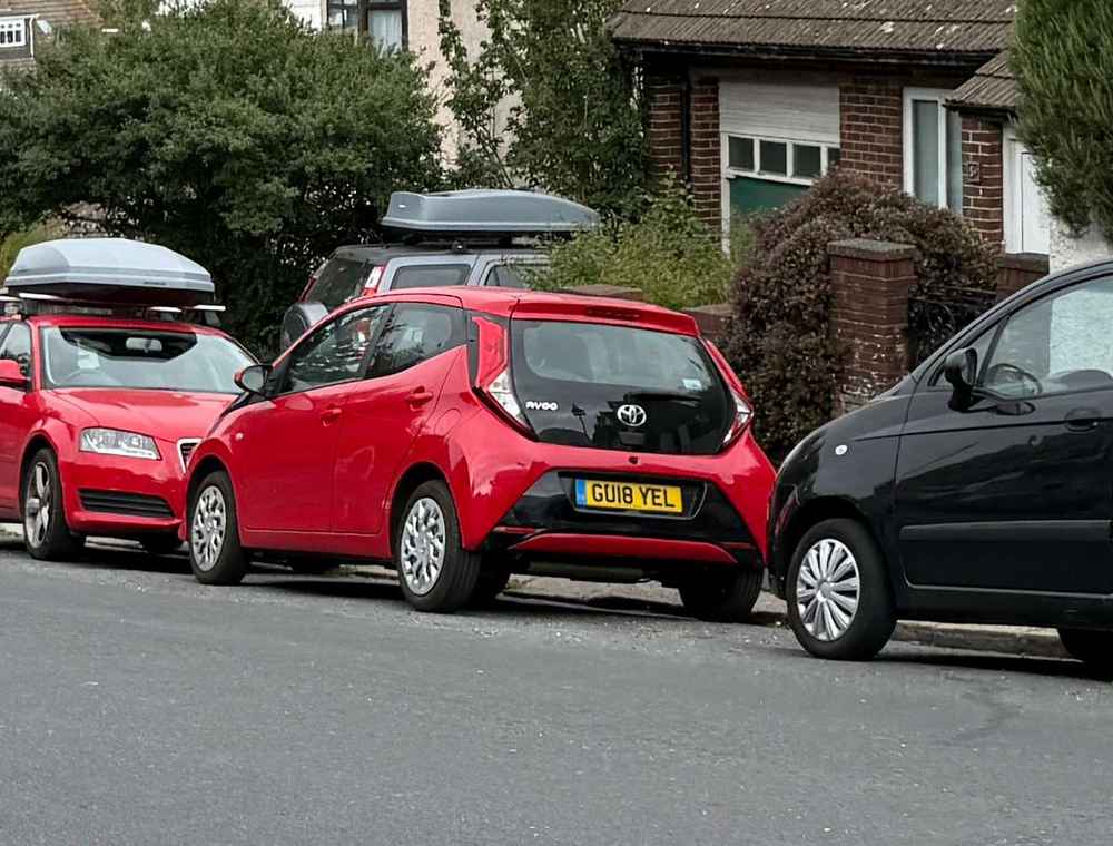 Photograph of GU18 YEL - a Red Toyota Aygo parked in Hollingdean by a non-resident. The sixth of ten photographs supplied by the residents of Hollingdean.