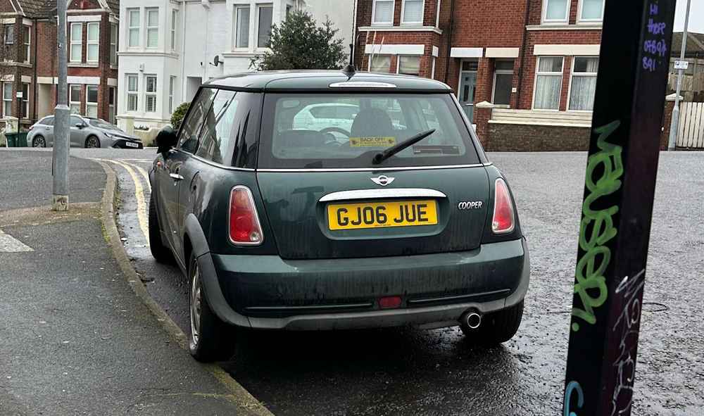 Photograph of GJ06 JUE - a Green Mini Cooper parked in Hollingdean by a non-resident. The seventh of twenty-four photographs supplied by the residents of Hollingdean.