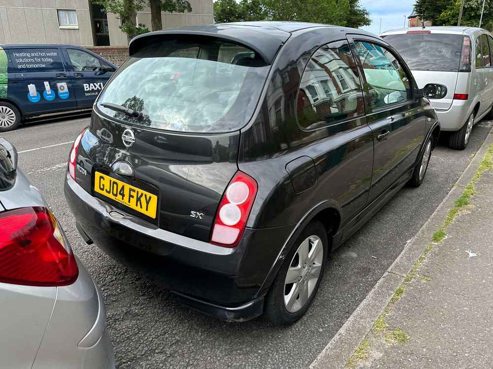 Photograph of GJ04 FKY - a Black Nissan Micra parked in Hollingdean by a non-resident. The third of six photographs supplied by the residents of Hollingdean.
