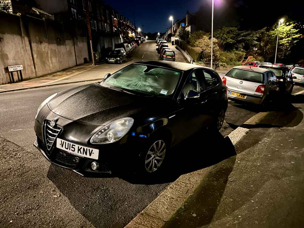 Photograph of VU15 KNV - a Black Alfa Romeo Giulietta parked in Hollingdean by a non-resident. The seventh of fifteen photographs supplied by the residents of Hollingdean.