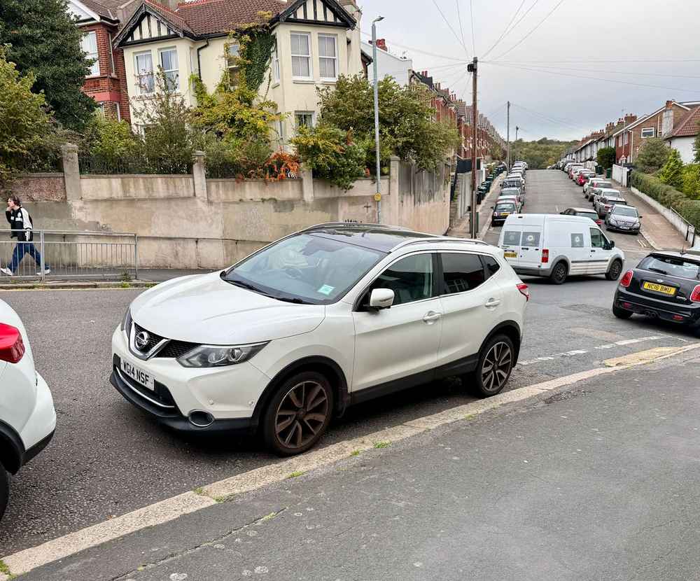Photograph of WG14 NSF - a White Nissan Qashqai parked in Hollingdean by a non-resident who uses the local area as part of their Brighton commute. The eleventh of twelve photographs supplied by the residents of Hollingdean.