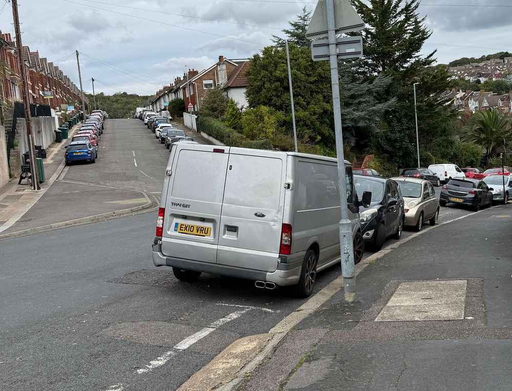 Photograph of EX10 VRU - a Silver Ford Transit parked in Hollingdean by a non-resident. The eighteenth of twenty-five photographs supplied by the residents of Hollingdean.