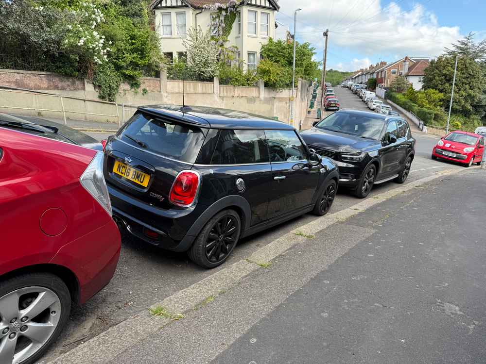 Photograph of NC16 BMU - a Black Mini Cooper parked in Hollingdean by a non-resident who uses the local area as part of their Brighton commute. The ninth of nine photographs supplied by the residents of Hollingdean.