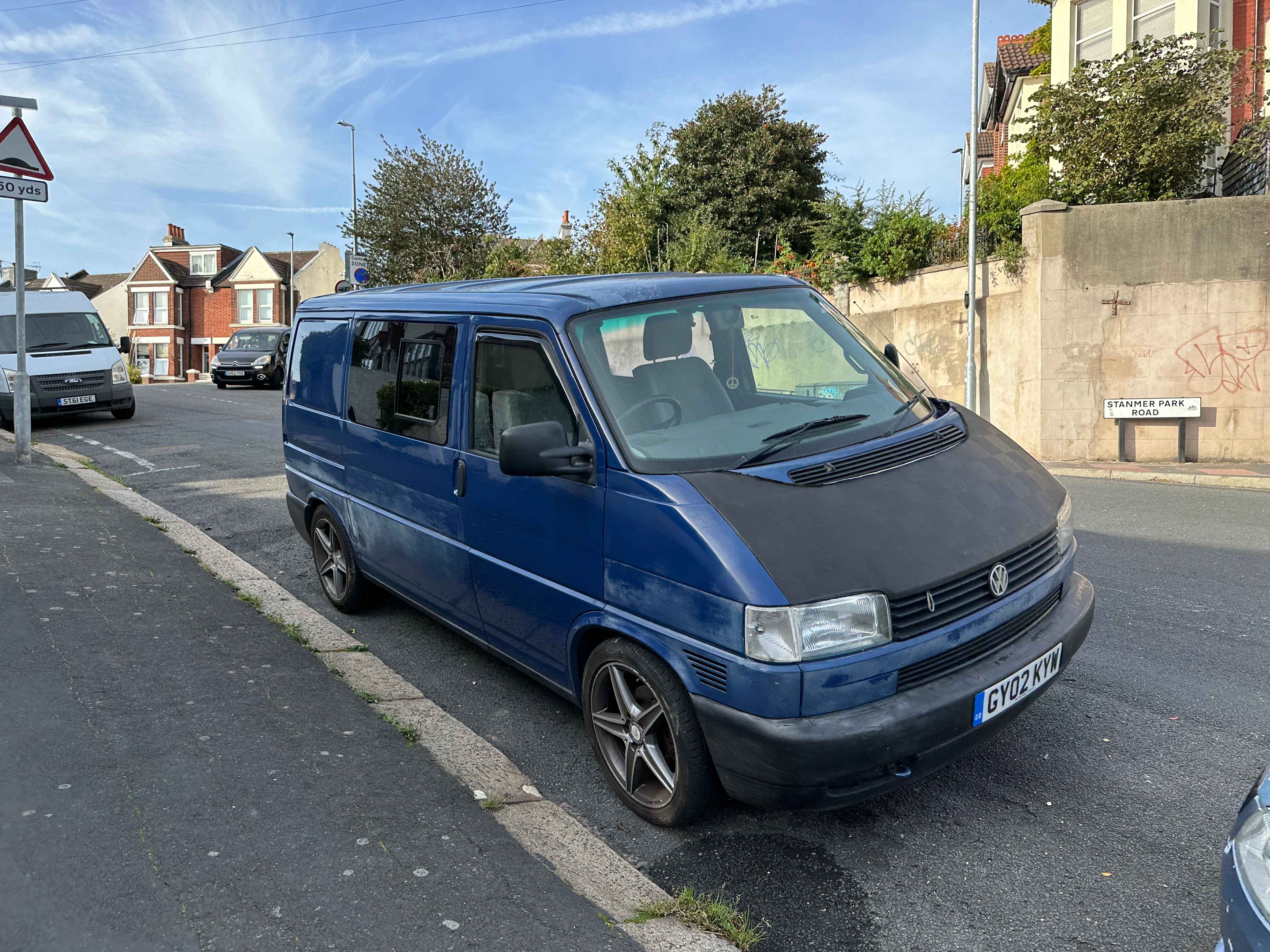 Photograph of GY02 KYW - a Blue Volkswagen Transporter camper van parked in Hollingdean by a non-resident. The eleventh of eighteen photographs supplied by the residents of Hollingdean.