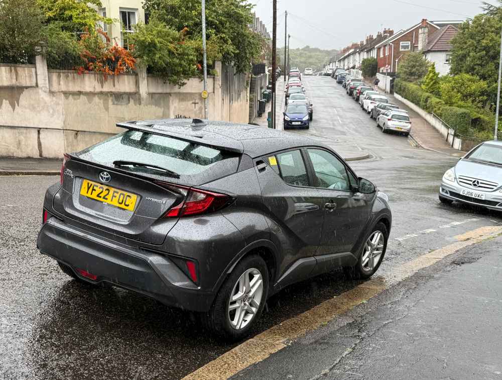 Photograph of YF22 FOC - a Grey Toyota C-HR taxi parked in Hollingdean by a non-resident. The fourth of seven photographs supplied by the residents of Hollingdean.