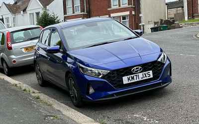 KM71 JXS, a Blue Hyundai i20 parked in Hollingdean