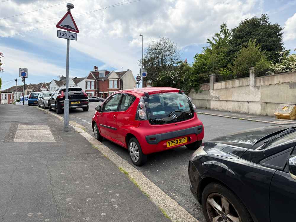 Photograph of YP58 XDF - a Red Citroen C1 parked in Hollingdean by a non-resident, and potentially abandoned. The thirteenth of fourteen photographs supplied by the residents of Hollingdean.