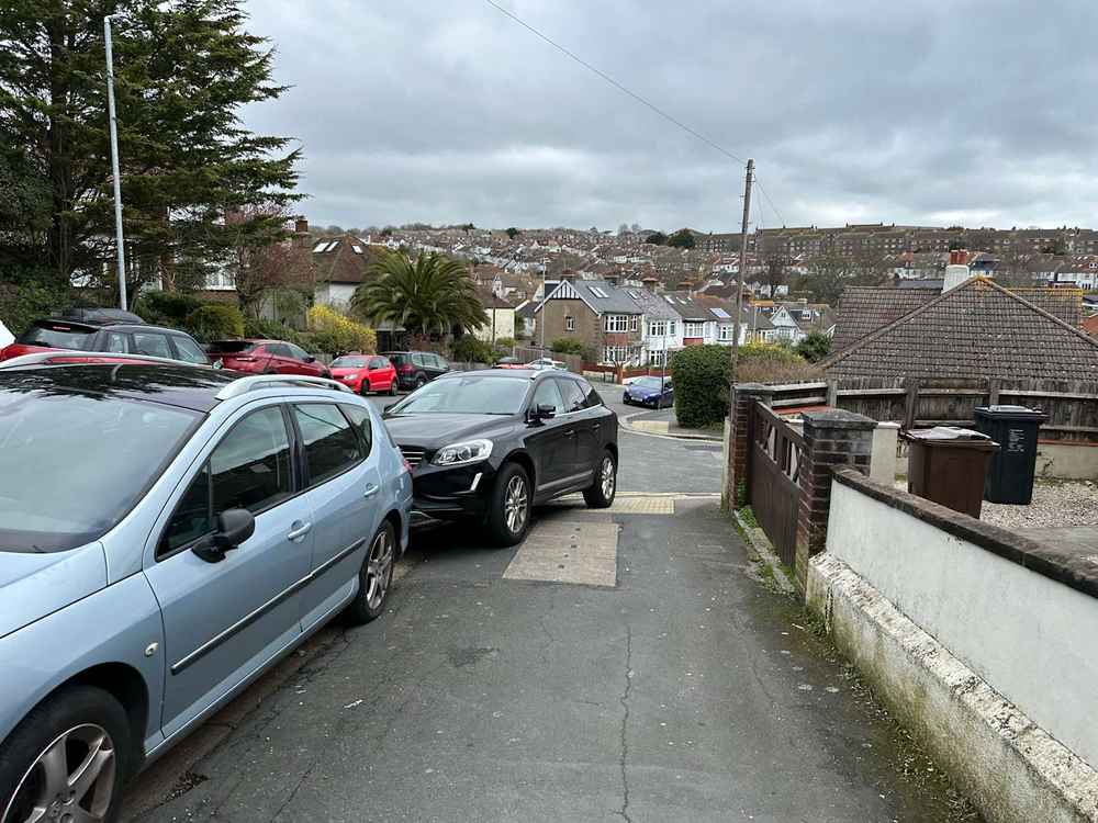 Photograph of DF65 ZZV - a Black Volvo XC60 parked in Hollingdean by a non-resident. The third of eleven photographs supplied by the residents of Hollingdean.