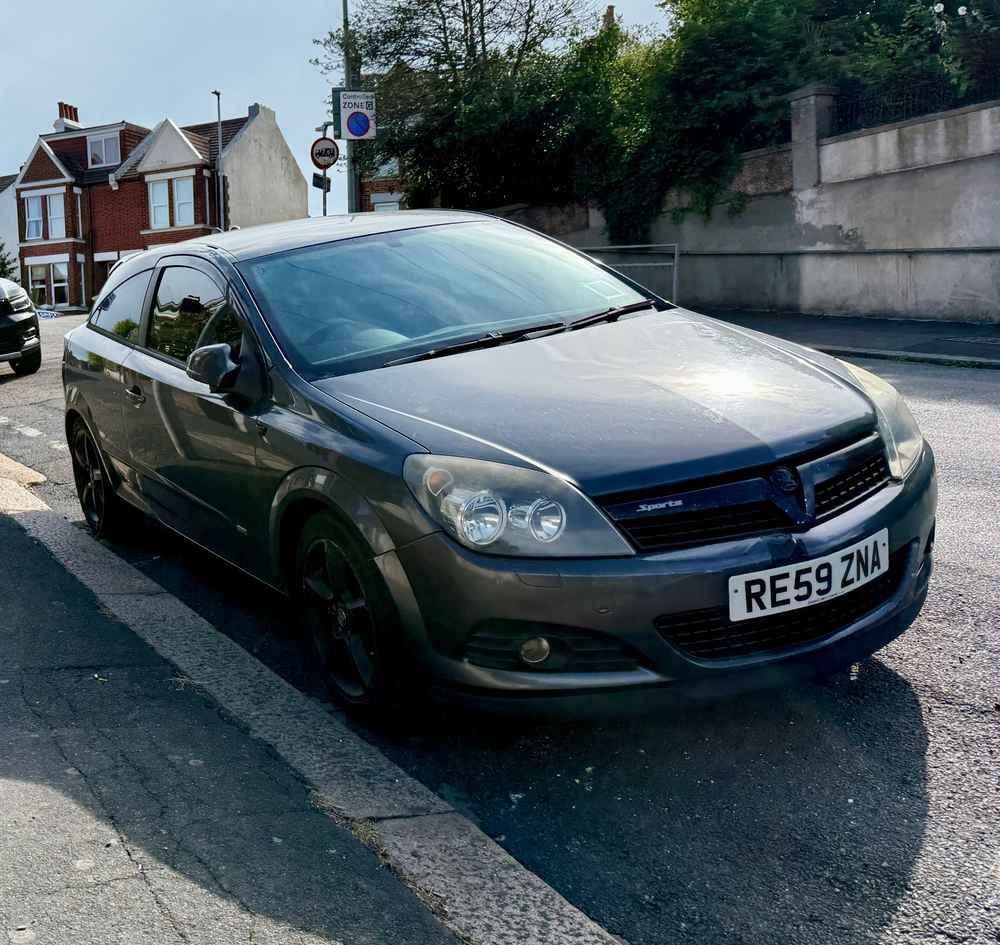 Photograph of RE59 ZNA - a Grey Vauxhall Astra parked in Hollingdean by a non-resident. The sixteenth of sixteen photographs supplied by the residents of Hollingdean.