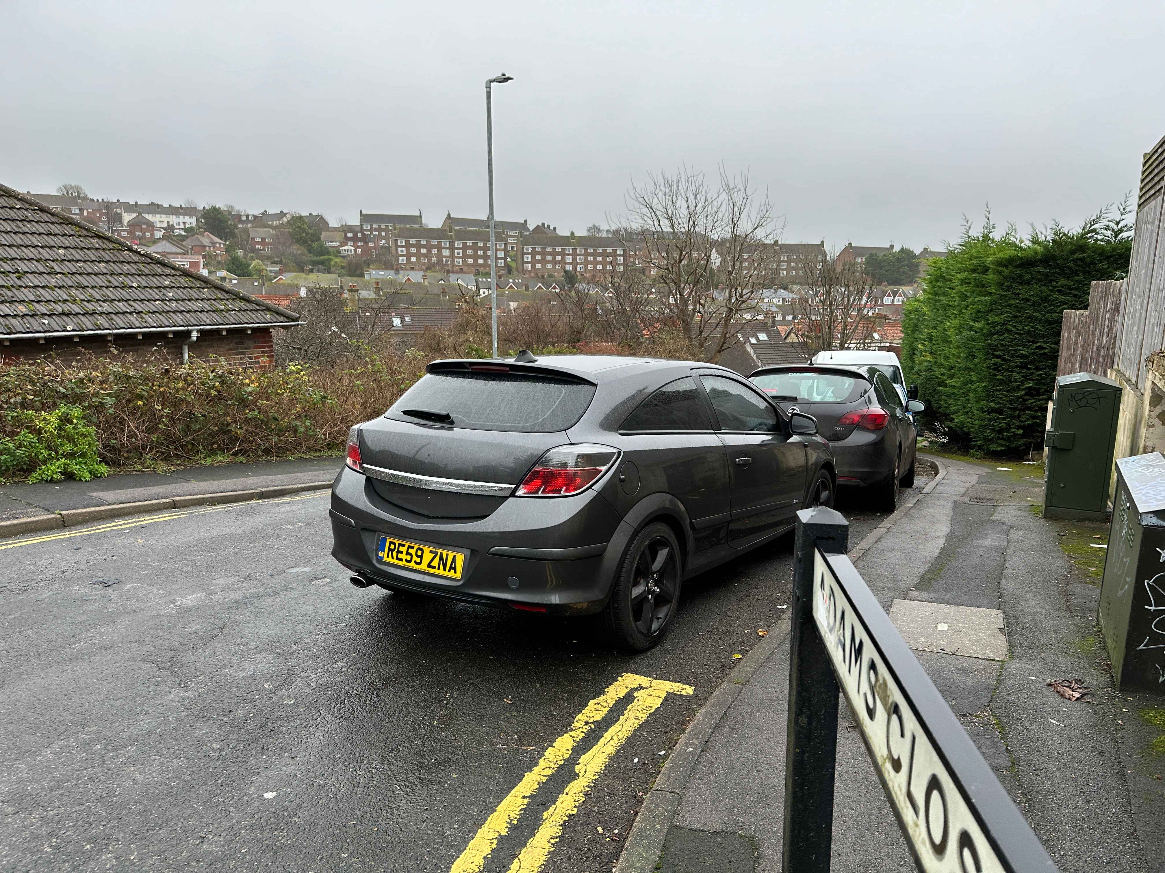 Photograph of RE59 ZNA - a Grey Vauxhall Astra parked in Hollingdean by a non-resident. The second of five photographs supplied by the residents of Hollingdean.