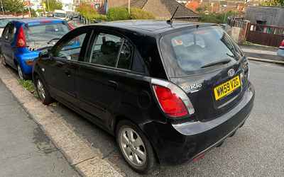 WM59 VZG, a Black Kia Rio parked in Hollingdean