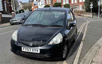 FY57 XYV, a Black Honda Jazz parked in Hollingdean