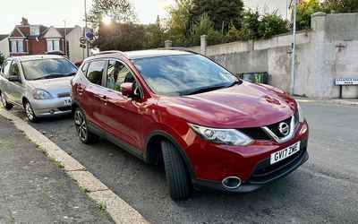 GV17 ZWE, a Red Nissan Qashqai parked in Hollingdean