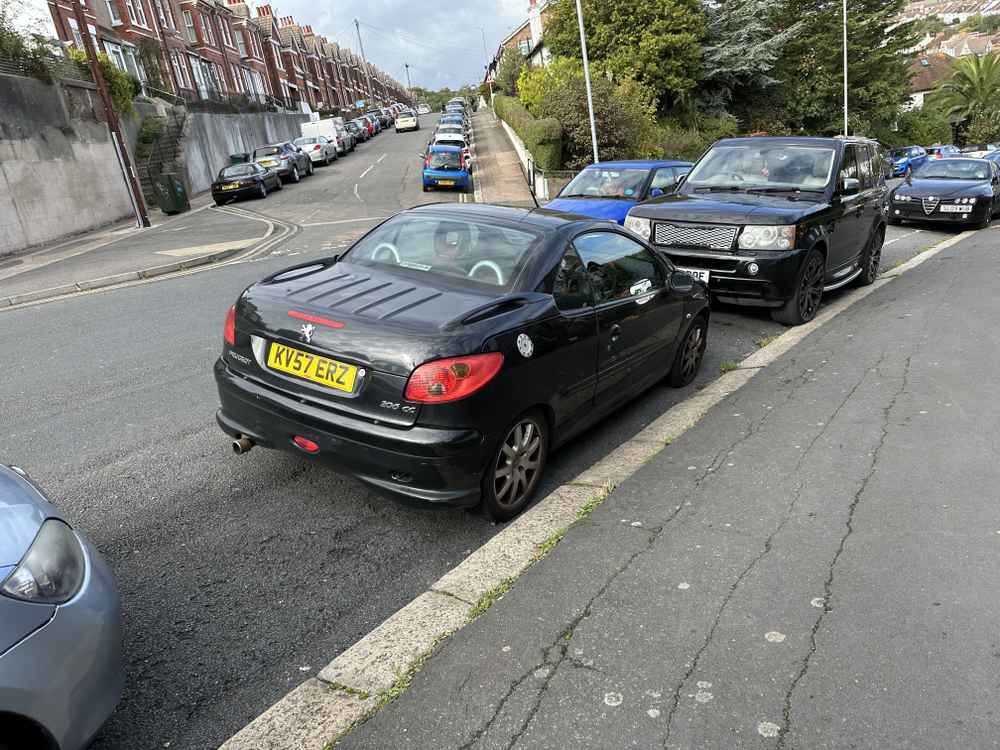 Photograph of KV57 ERZ - a Black Peugeot 206 parked in Hollingdean by a non-resident. The fifth of eight photographs supplied by the residents of Hollingdean.
